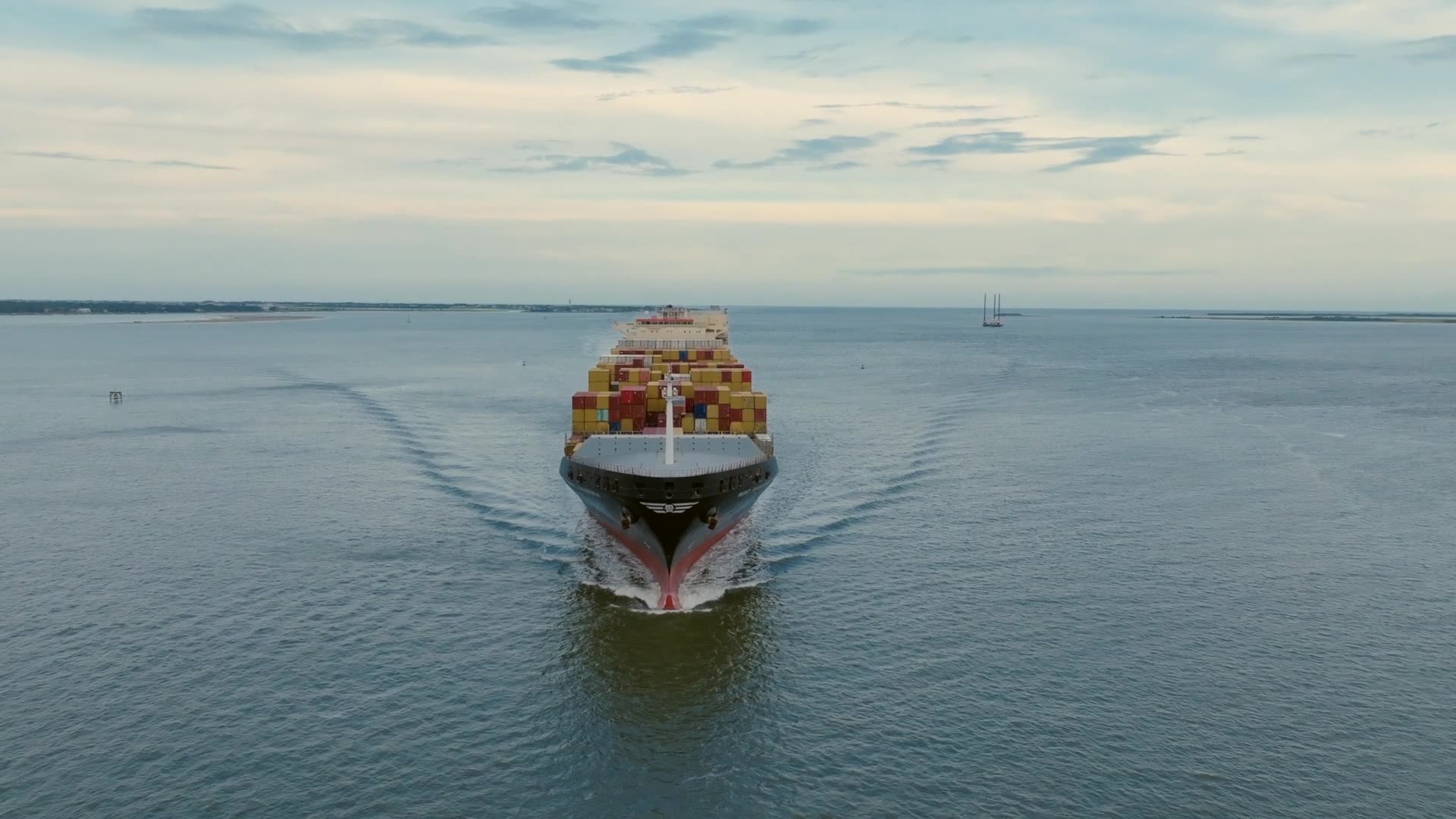 Container ship approaching at sea